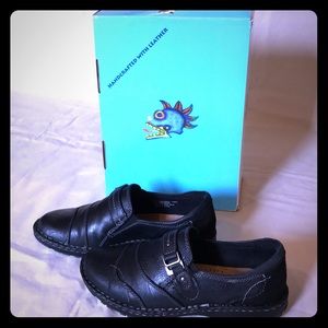 Michael M. black slip on leather shoes.